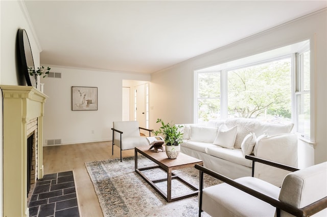 16 Aquarius Ln, Greece, NY 14612 - living room featuring ornamental molding, wood finished floors, and a fireplace with flush hearth