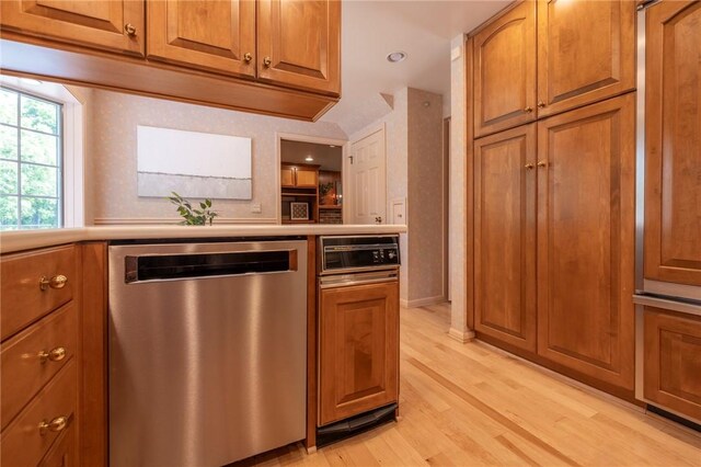 115 Crandon Way, Brighton, NY 14618 - kitchen featuring stainless steel dishwasher, light wood-style floors, light countertops, brown cabinetry, and recessed lighting