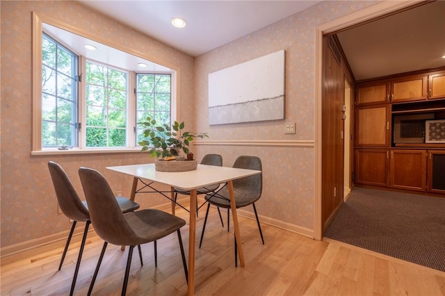 115 Crandon Way, Brighton, NY 14618 - dining space featuring wallpapered walls, light wood-style floors, plenty of natural light, and recessed lighting