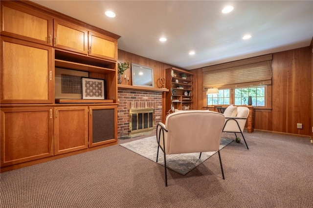 115 Crandon Way, Brighton, NY 14618 - living room with wood walls, carpet, recessed lighting, a fireplace, and built in features