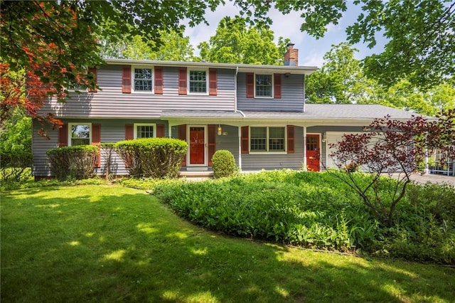 115 Crandon Way, Brighton, NY 14618 - view of front of property with a chimney, an attached garage, and a front lawn