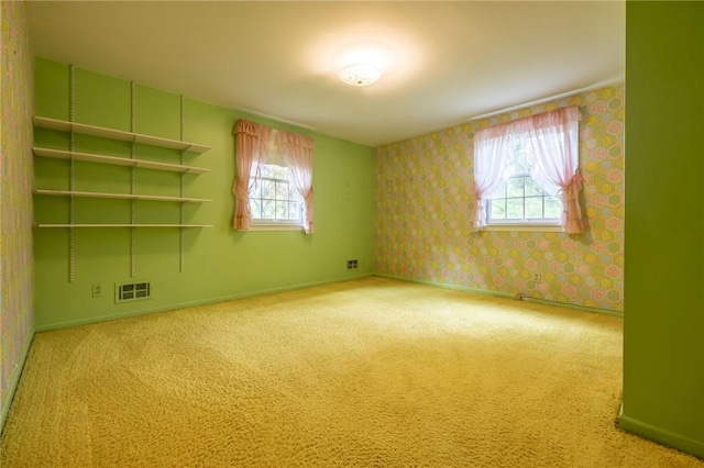 115 Crandon Way, Brighton, NY 14618 - unfurnished room featuring plenty of natural light, wallpapered walls, and carpet