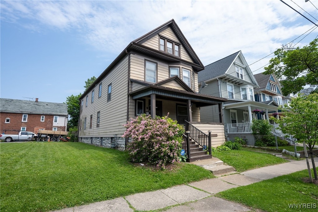 171 Herkimer St, Buffalo, NY 14213 - traditional style home with a porch and a front yard