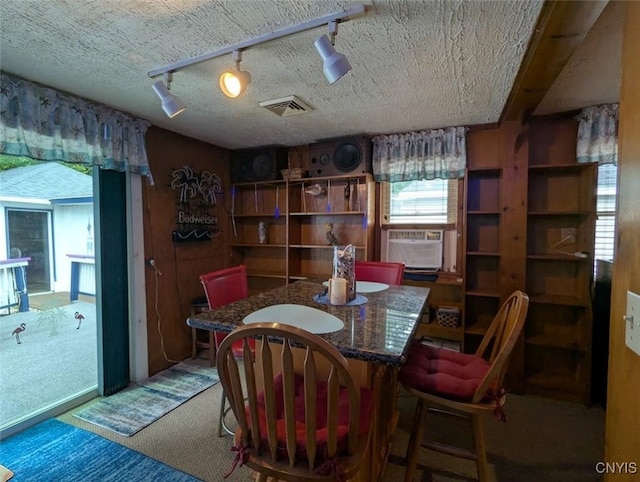2008 Main St, Vienna, NY 13157 - carpeted dining room featuring cooling unit and rail lighting