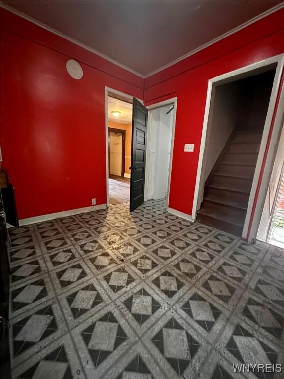 524 10th St, Niagara Falls, NY 14301 - empty room featuring stairs and ornamental molding