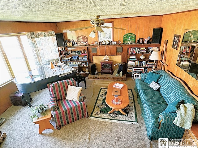 2411 Lakeside Dr, Busti, NY 14710 - living area featuring plenty of natural light, an ornate ceiling, carpet floors, wood walls, and ceiling fan