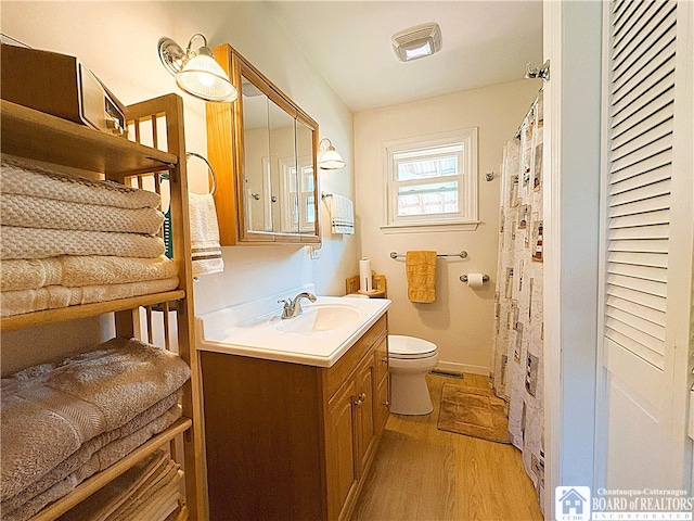 2411 Lakeside Dr, Busti, NY 14710 - full bath with wood finished floors and vanity