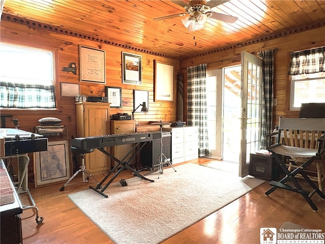 2411 Lakeside Dr, Busti, NY 14710 - office space featuring wooden walls, wood ceiling, ceiling fan, and wood finished floors