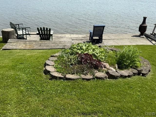 27217 Three Mile Point Rd, Lyme, NY 13622 - dock area with a yard and a water view