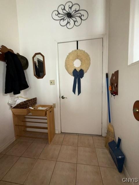 27217 Three Mile Point Rd, Lyme, NY 13622 - doorway to outside featuring light tile patterned floors