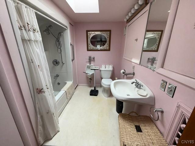 27217 Three Mile Point Rd, Lyme, NY 13622 - full bathroom with a skylight and shower / bath combination with curtain