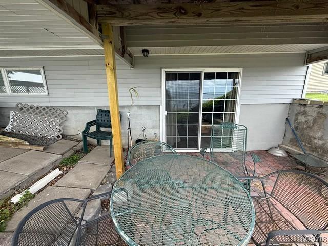 27217 Three Mile Point Rd, Lyme, NY 13622 - view of patio / terrace with outdoor dining area