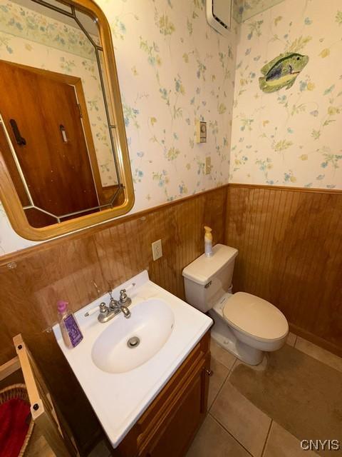 27217 Three Mile Point Rd, Lyme, NY 13622 - bathroom featuring a wainscoted wall, vanity, and tile patterned flooring