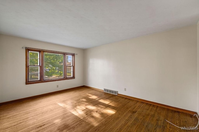 446 77th St, Niagara Falls, NY 14304 - unfurnished room with light wood-style flooring and baseboards