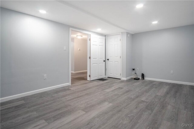 8430 Willow St, Le Ray, NY 13637 - finished basement with wood finished floors and recessed lighting
