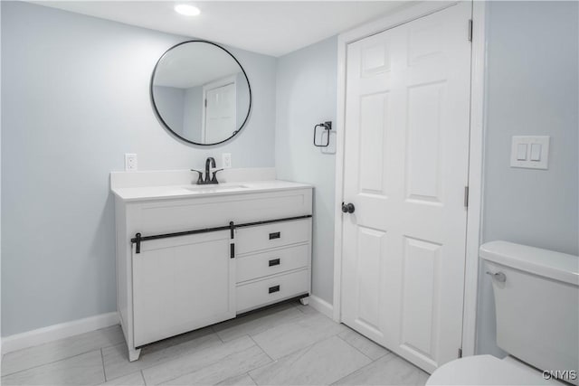 8430 Willow St, Le Ray, NY 13637 - bathroom with vanity, recessed lighting, and marble finish flooring