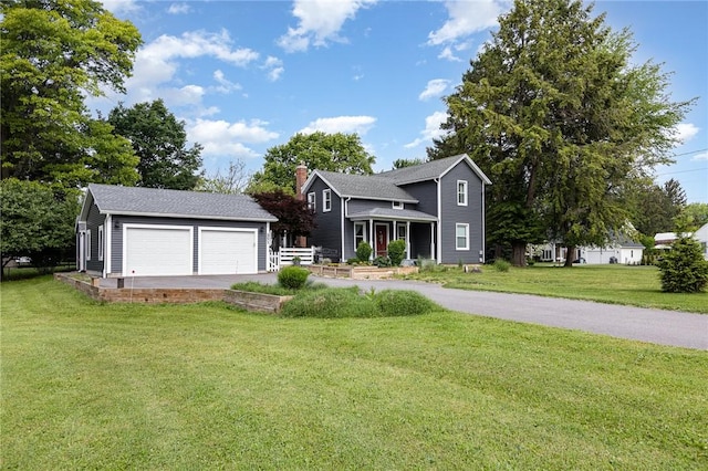 351 Jefferson Ave, Perinton, NY 14450 - traditional-style house with an outdoor structure, a front lawn, a detached garage, and a chimney