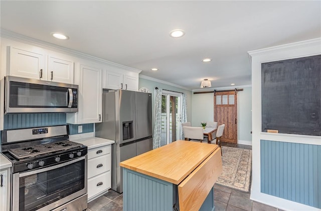 351 Jefferson Ave, Perinton, NY 14450 - kitchen featuring stainless steel appliances, ornamental molding, white cabinets, butcher block countertops, and recessed lighting