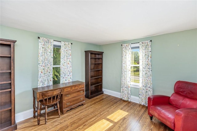 351 Jefferson Ave, Perinton, NY 14450 - sitting room featuring wood finished floors, plenty of natural light, and an office area