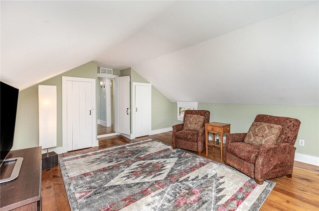351 Jefferson Ave, Perinton, NY 14450 - sitting room featuring wood finished floors and vaulted ceiling