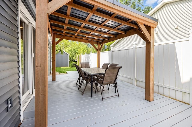351 Jefferson Ave, Perinton, NY 14450 - wooden terrace with outdoor dining area and a storage shed