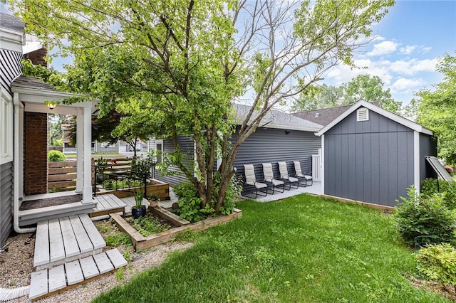 351 Jefferson Ave, Perinton, NY 14450 - view of grassy yard featuring a patio area and an outdoor structure