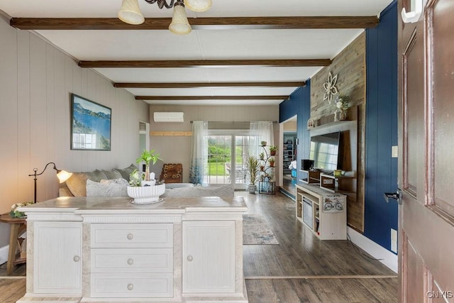 7118 Glass Factory Rd, Trenton, NY 13354 - kitchen with dark wood finished floors, wood walls, a wall unit AC, beam ceiling, and light countertops