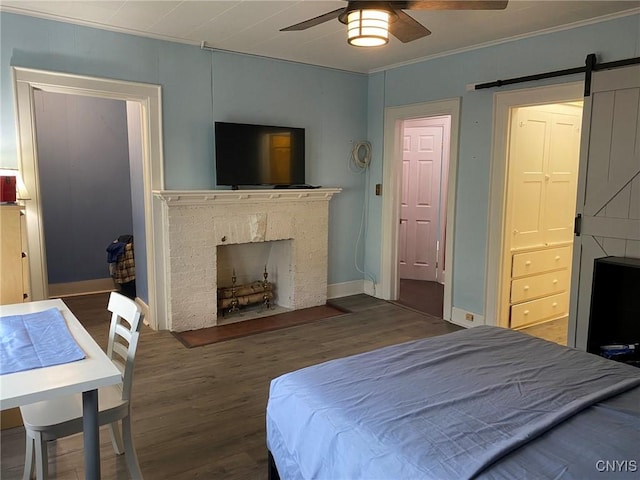19 Genesee Ct Unit 19, Utica, NY 13502 - bedroom with wood finished floors, a fireplace with flush hearth, ceiling fan, and crown molding