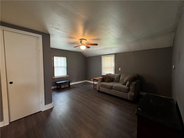 28 Mckune Ave, Foster-Town, PA 16701 - living room with ceiling fan, dark wood finished floors, lofted ceiling, and a textured ceiling