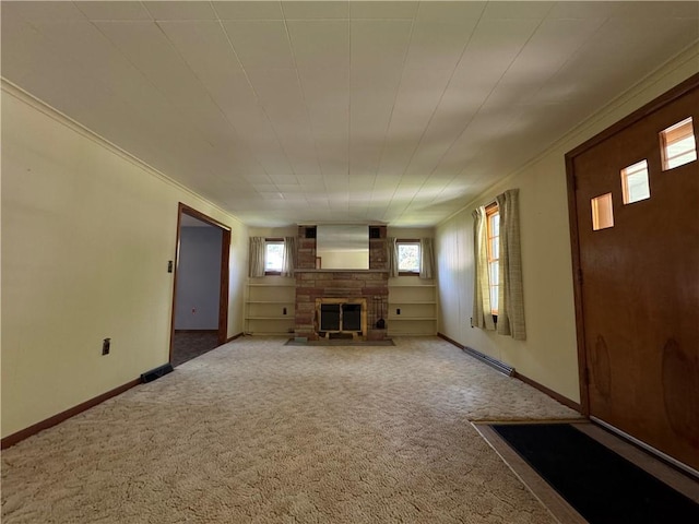 28 Mckune Ave, Foster-Town, PA 16701 - unfurnished living room featuring a fireplace, carpet flooring, and ornamental molding