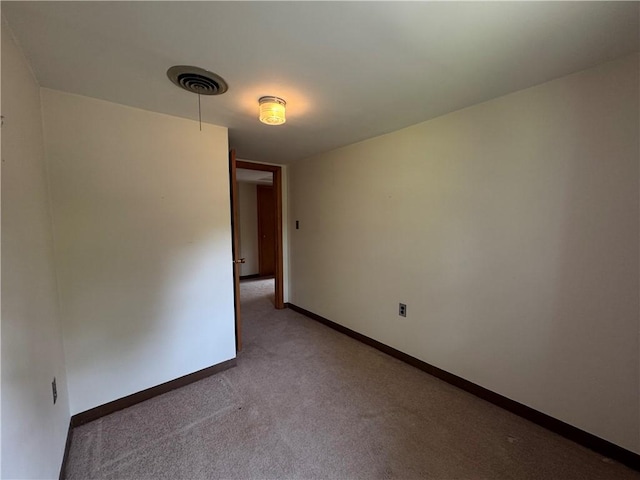 28 Mckune Ave, Foster-Town, PA 16701 - spare room featuring baseboards and light colored carpet