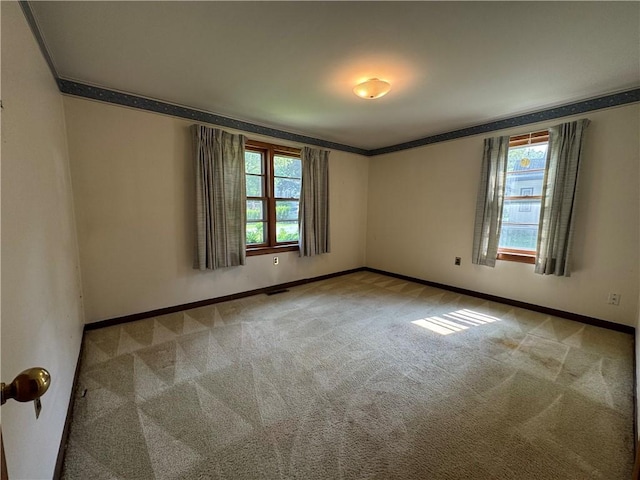 28 Mckune Ave, Foster-Town, PA 16701 - carpeted empty room with crown molding and baseboards