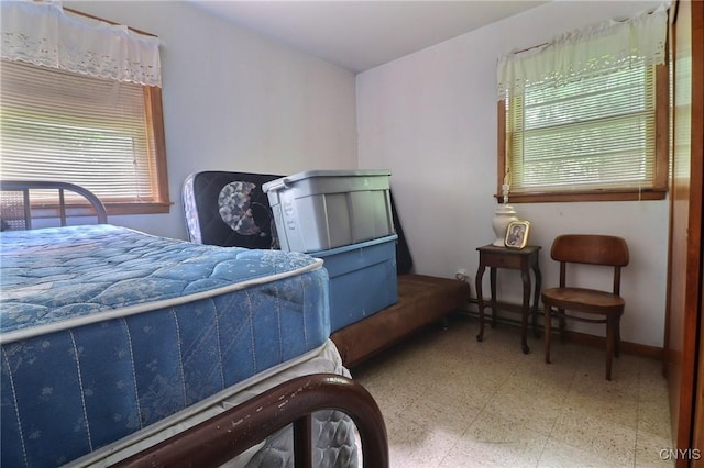 797 Hicks Rd, Warren, NY 13407 - bedroom featuring multiple windows and tile patterned floors