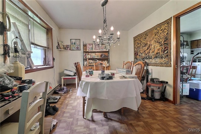 797 Hicks Rd, Warren, NY 13407 - dining room with a chandelier and baseboards