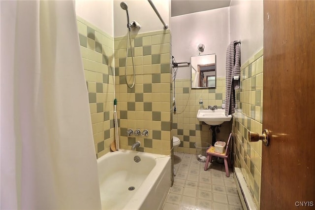 797 Hicks Rd, Warren, NY 13407 - bathroom with tile walls, tile patterned floors, shower / bath combination, a wainscoted wall, and baseboard heating