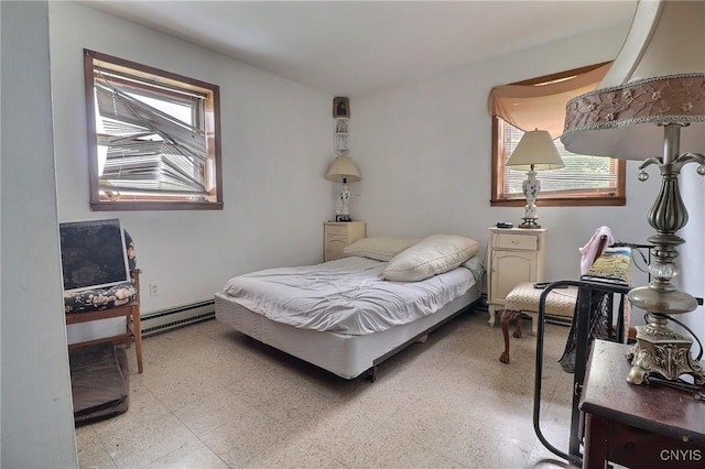 797 Hicks Rd, Warren, NY 13407 - bedroom featuring a baseboard radiator, multiple windows, and light flooring