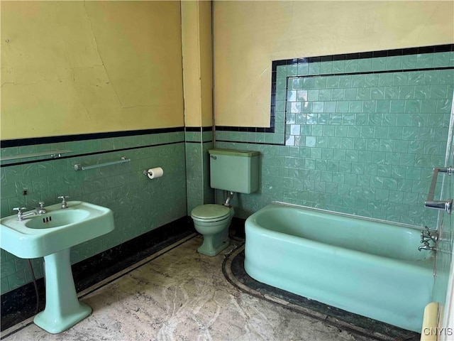 1902 E River Rd, Olean-Town, NY 14760 - full bath with a bathtub, tile walls, and wainscoting