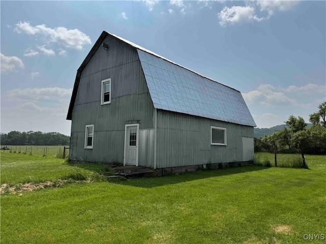 1902 E River Rd, Olean-Town, NY 14760 - view of property exterior featuring a barn, a gambrel roof, a lawn, and an outbuilding