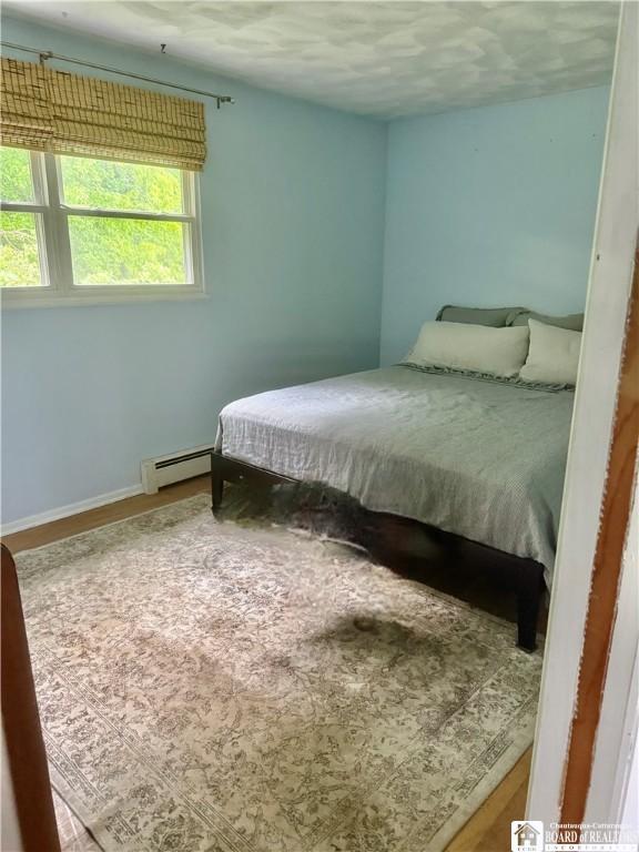 46 Pardee Ave, Jamestown, NY 14701 - bedroom featuring baseboard heating and baseboards