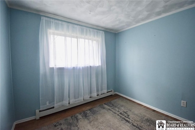 46 Pardee Ave, Jamestown, NY 14701 - unfurnished room with a baseboard heating unit, ornamental molding, and wood finished floors