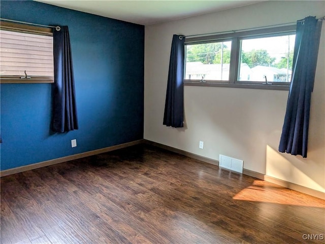 6 Cotty Dr, Dewitt, NY 13057 - empty room featuring wood finished floors and baseboards