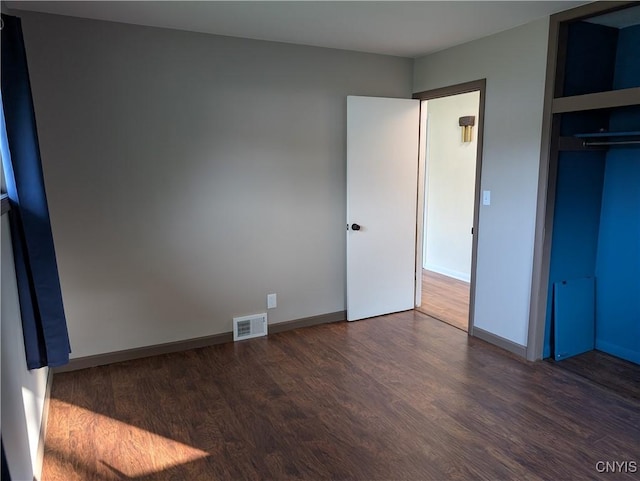 6 Cotty Dr, Dewitt, NY 13057 - unfurnished bedroom featuring wood finished floors and a closet