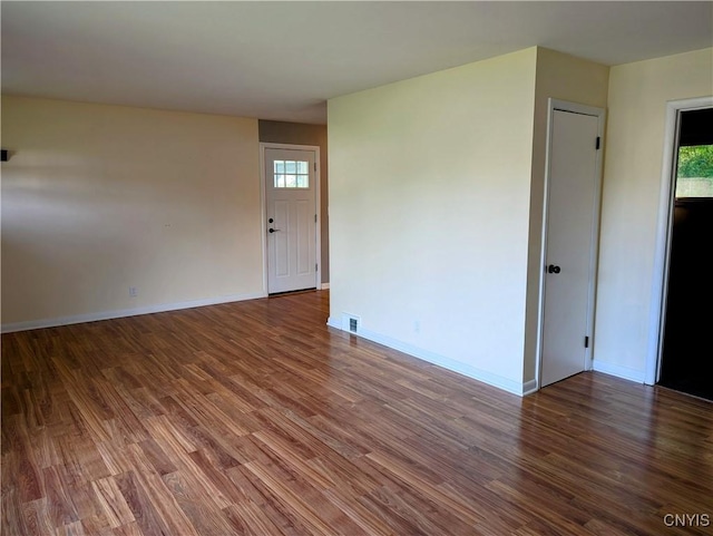6 Cotty Dr, Dewitt, NY 13057 - spare room with wood finished floors and healthy amount of natural light