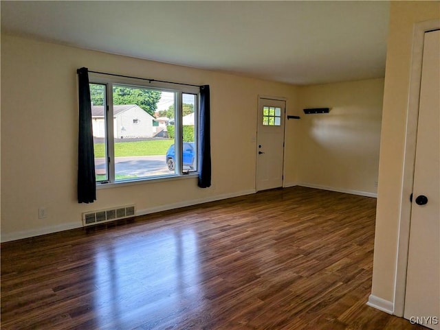 6 Cotty Dr, Dewitt, NY 13057 - entrance foyer with dark wood finished floors and baseboards
