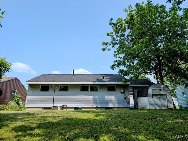 6 Cotty Dr, Dewitt, NY 13057 - rear view of property with a lawn and a shed