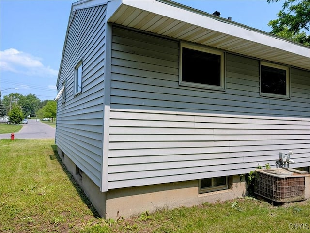 6 Cotty Dr, Dewitt, NY 13057 - view of side of property with a yard and a central air condition unit