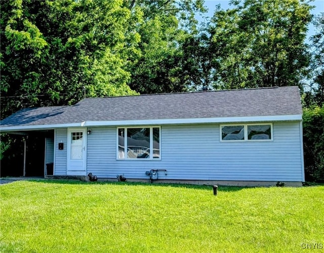 6 Cotty Dr, Dewitt, NY 13057 - ranch-style house featuring a front yard and a carport