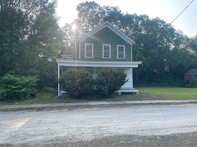 129 N Main St, Manheim, NY 13329 - view of front of home featuring covered porch