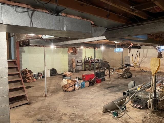 824 Franklin St, Skaneateles, NY 13152 - below grade area featuring stairs