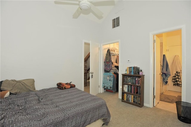 106 Weston Ln, Erwin, NY 14870 - bedroom featuring carpet floors, a spacious closet, high vaulted ceiling, and a closet